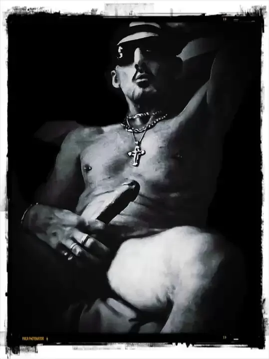 B&W photograph of a man in a seductive pose 4