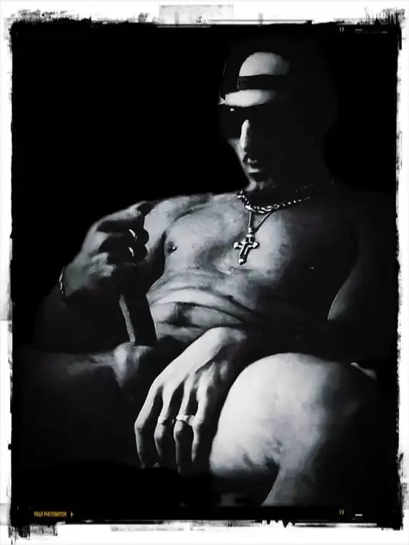 B&W photograph of a man in a seductive pose 3