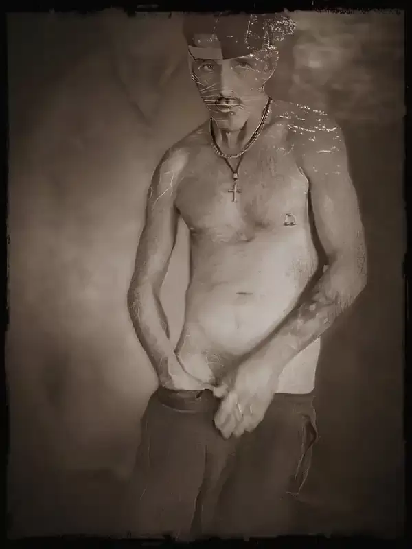vintage photo of shirtless man posing 